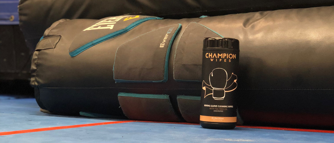 Boxing glove cleaning wipes (champion wipes) on the ground of a gym
